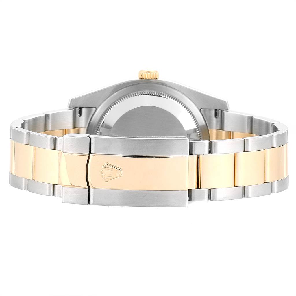 The image shows the back view of a Rolex Datejust 116233 Men's Steel and Gold (two tone) Brown Dial 116233 Men's Steel and Gold (two tone) Brown Dial watch, highlighting the case back and the two-tone bracelet and clasp.