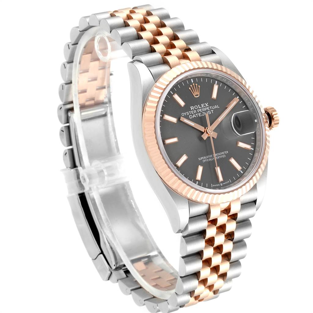 This image shows a side view of the Rolex Datejust 126231 Men
s Steel and Gold (two tone) Grey Dial 126231 Men
s Steel and Gold (two tone) Grey Dial watch, featuring a two-tone bracelet and a fluted bezel.