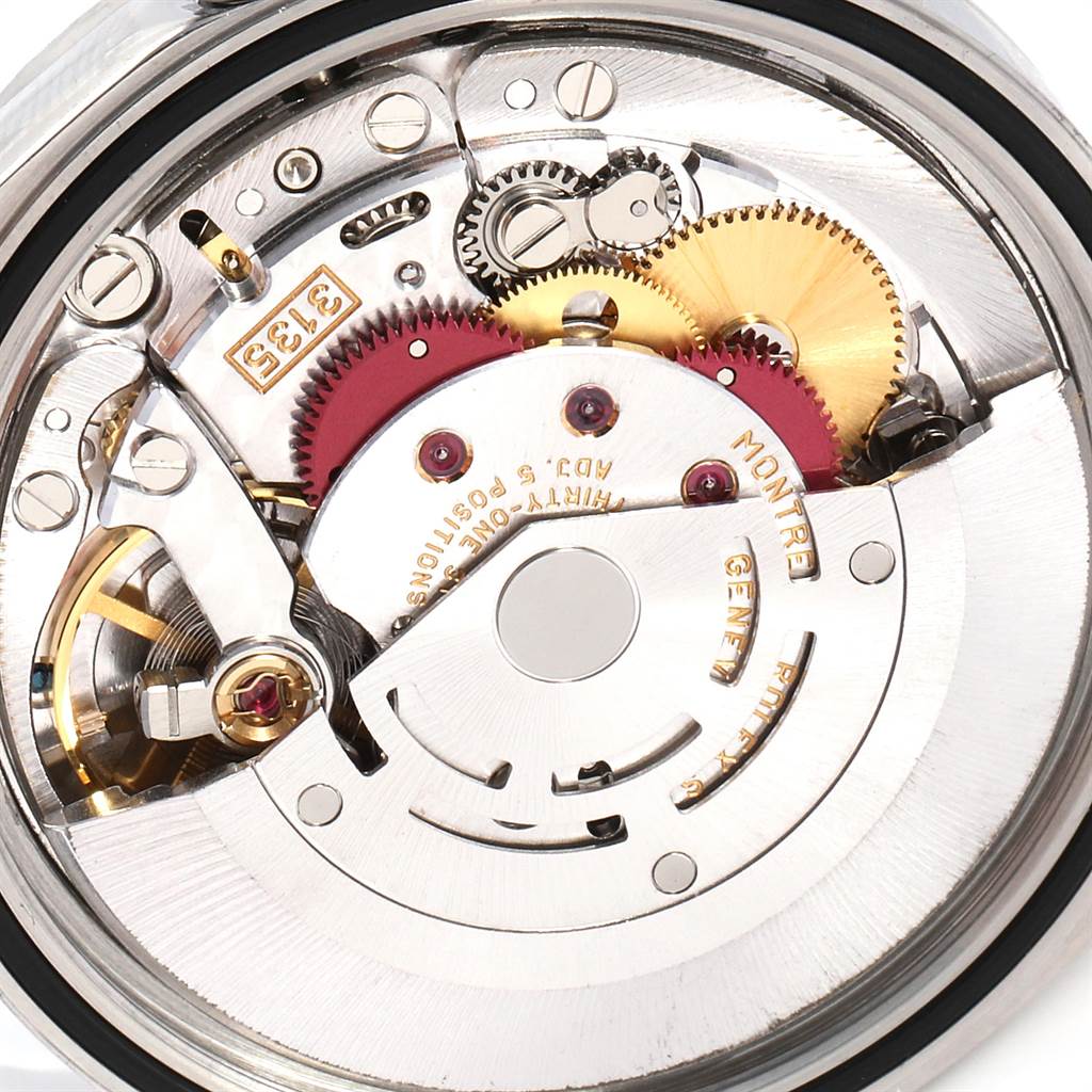 This image shows a close-up view of the movement and internal components of a Rolex Datejust 16220 Men's Stainless Steel Blue Dial 16220 Men's Stainless Steel Blue Dial watch.