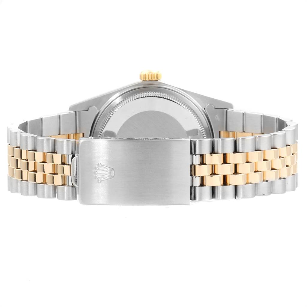 The image shows the back view of the Rolex Datejust 16013 Men's Stainless Steel Black Dial 16013 Men's Stainless Steel Black Dial watch, highlighting the clasp and two-tone bracelet.