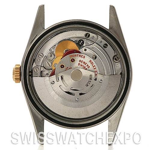 The image shows the back of a Rolex Datejust 16233 Men's Stainless Steel White Dial 16233 Men's Stainless Steel White Dial watch, revealing its internal mechanism with visible gears and rotor.