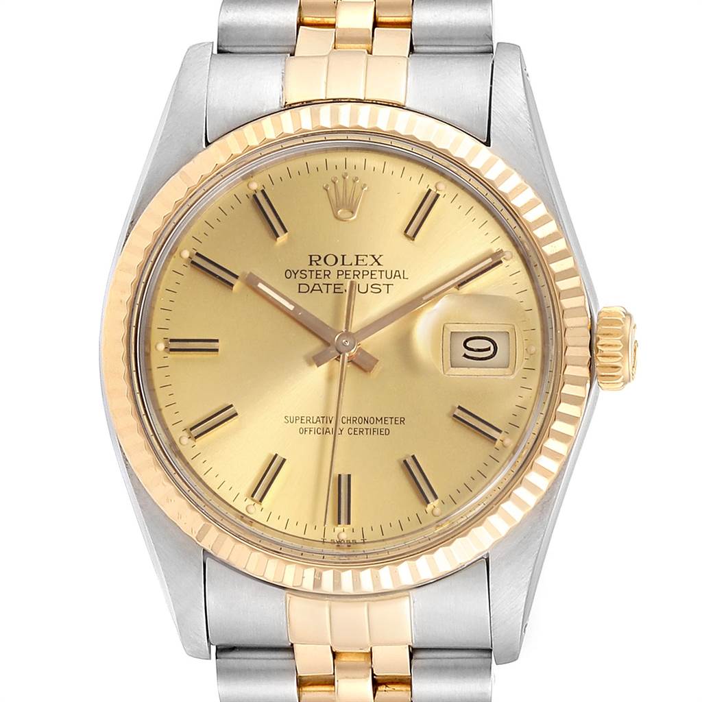 This image shows a front view of the Rolex Datejust 16013 Men
s Steel and Gold (two tone) Champagne Dial 16013 Men
s Steel and Gold (two tone) Champagne Dial watch, highlighting its dial, bezel, crown, and part of the bracelet.