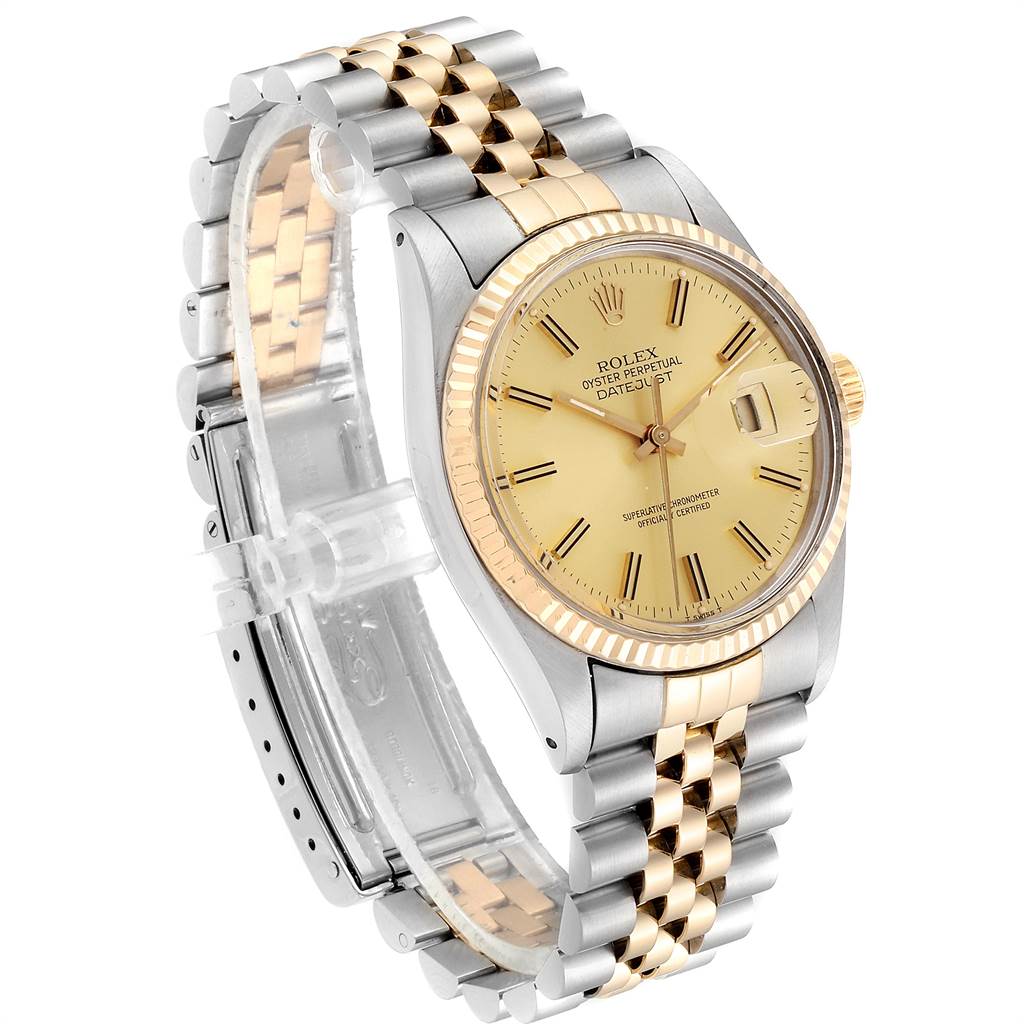 The Rolex Datejust 16013 Men
s Steel and Gold (two tone) Champagne Dial 16013 Men
s Steel and Gold (two tone) Champagne Dial watch is shown at a three-quarter angle, highlighting its two-tone bracelet and champagne dial.