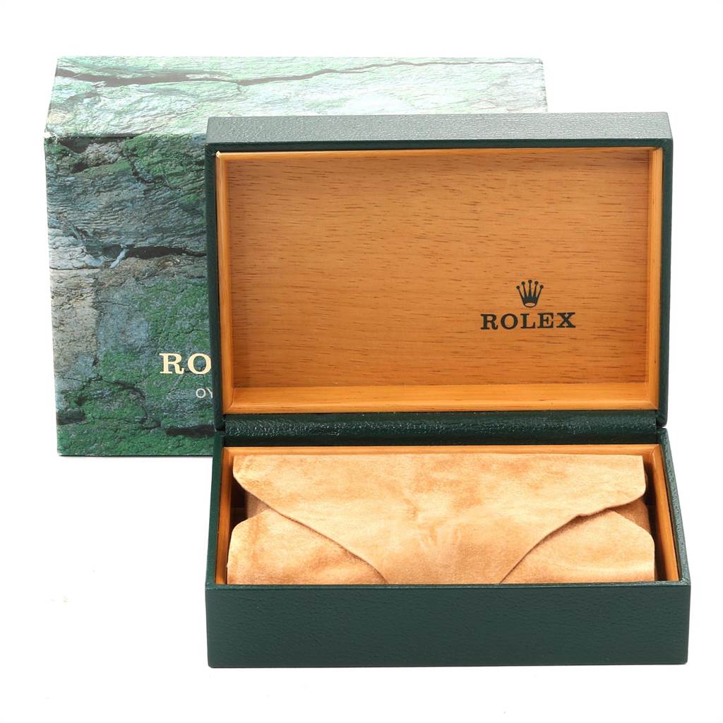 This image shows an open Rolex Datejust 16233 Men
s Steel and Gold (two tone) Champagne Dial 16233 Men
s Steel and Gold (two tone) Champagne Dial watch box with an interior cushion, positioned from a front angle.