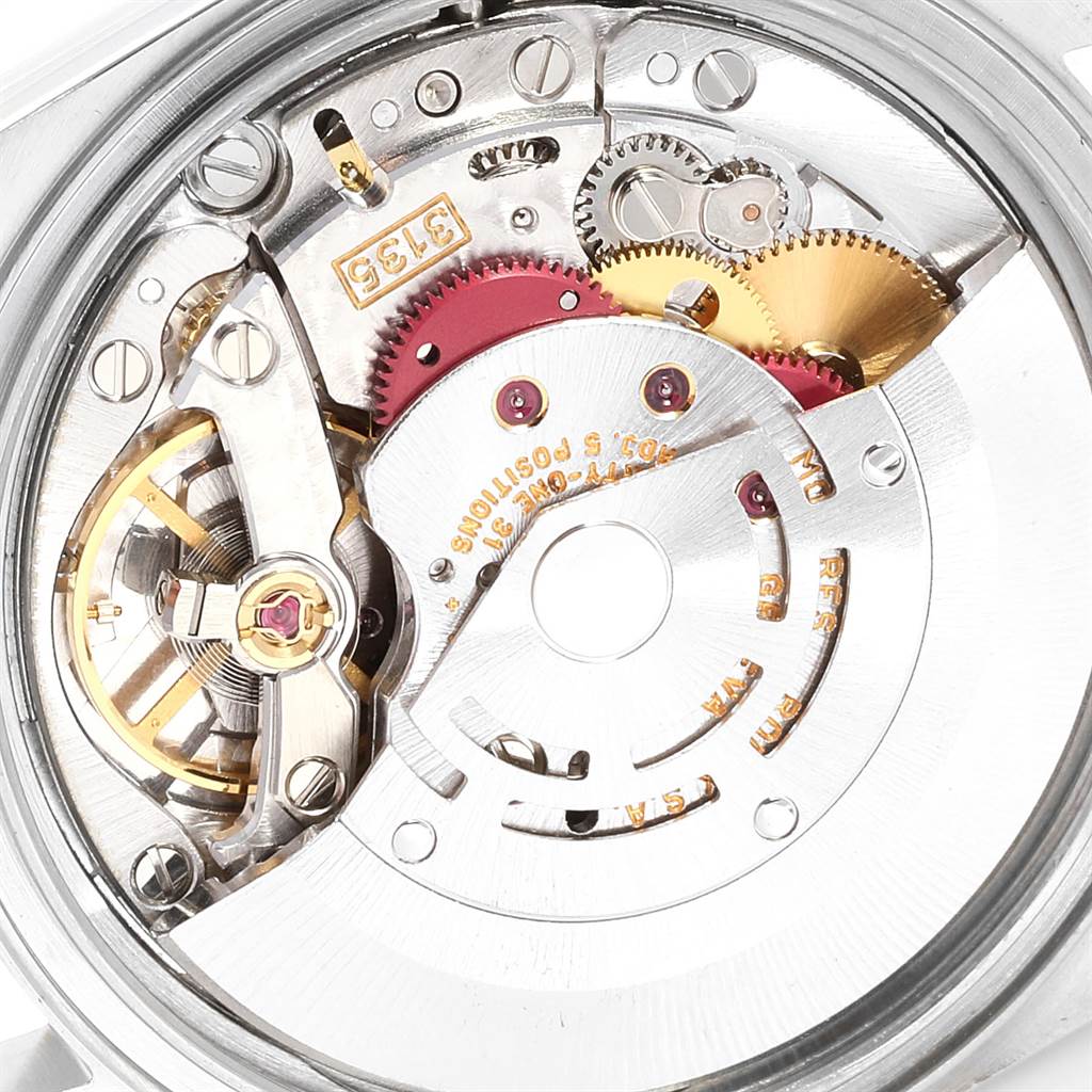 This close-up image shows the intricate internal mechanics of the Rolex Datejust 16233 Men
s Steel and Gold (two tone) Champagne Dial 16233 Men
s Steel and Gold (two tone) Champagne Dial watch model.
