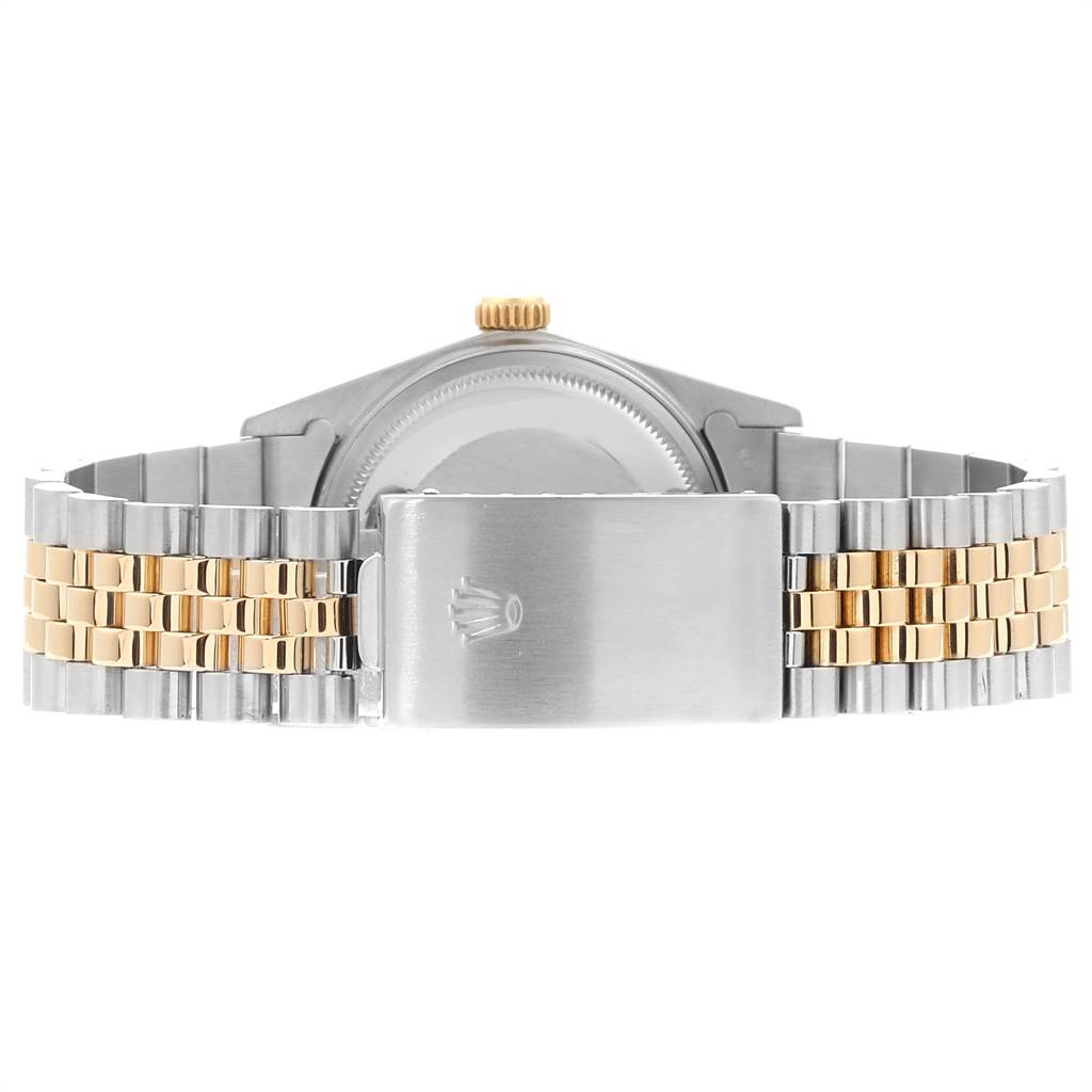 The image shows the back view of a Rolex Datejust 16013 Men's Stainless Steel Champagne Dial 16013 Men's Stainless Steel Champagne Dial model, highlighting the clasp and bracelet.