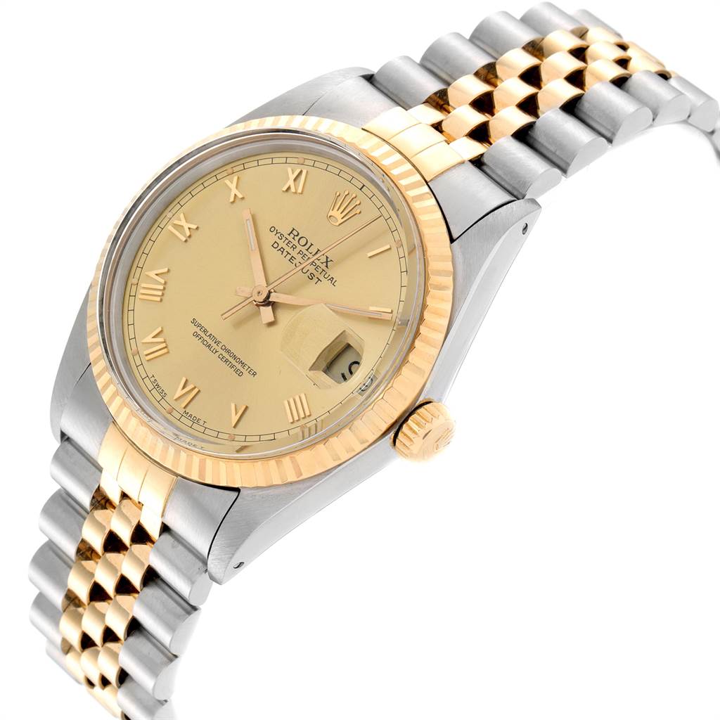 This image shows a side and top angle view of the Rolex Datejust 16013 Men's Stainless Steel Champagne Dial 16013 Men's Stainless Steel Champagne Dial watch, highlighting the face, bezel, and band.