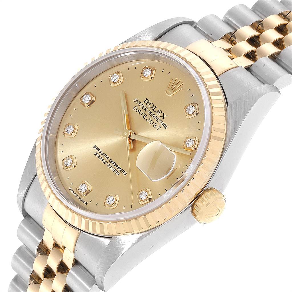 The image shows a Rolex Datejust 16233 Men
s Steel and Gold (two tone) Champagne Dial 16233 Men
s Steel and Gold (two tone) Champagne Dial watch at a three-quarter angle, highlighting the face, bezel, crown, and part of the bracelet.