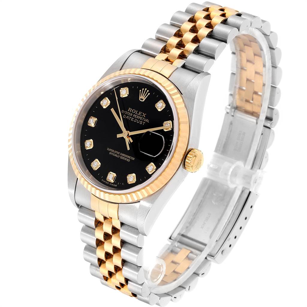 The Rolex Datejust 16233 Men
s Steel and Gold (two tone) Black Dial 16233 Men
s Steel and Gold (two tone) Black Dial watch is shown at a three-quarter angle, displaying the black dial, diamond markers, fluted bezel, and two-tone Jubilee bracelet.
