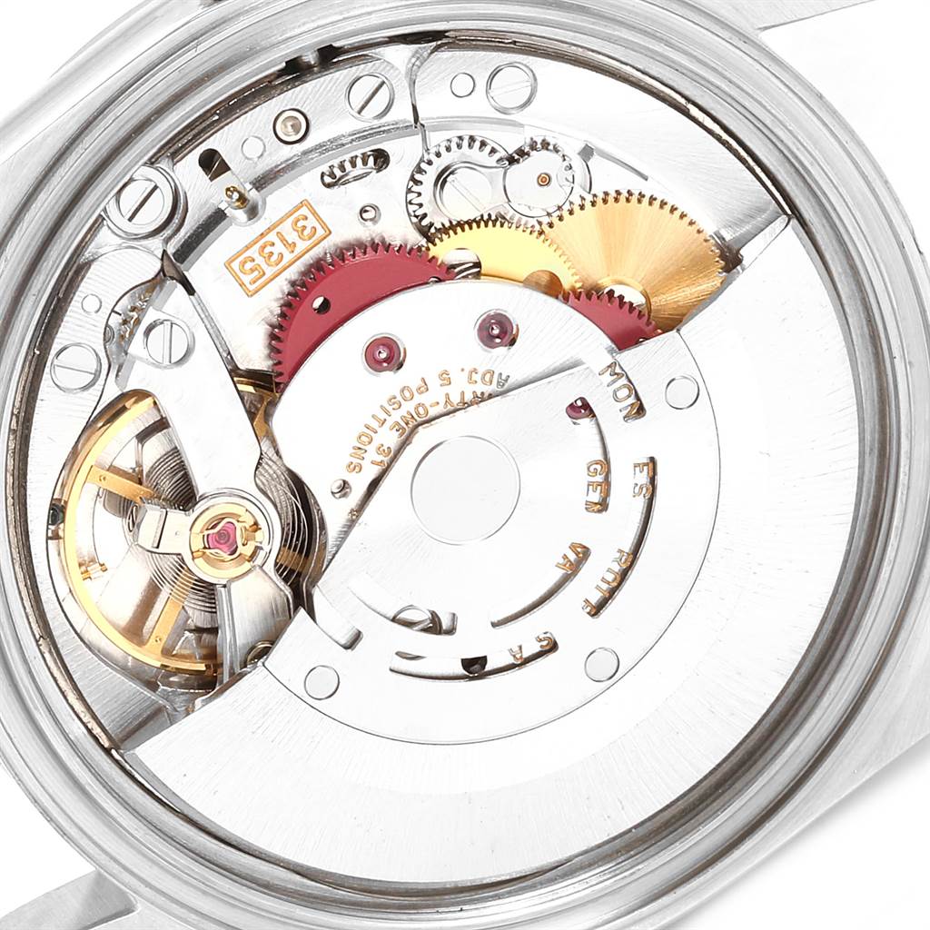 The image shows a close-up view of the internal movement mechanism of a Rolex Datejust 16233 Men's Steel and Gold (two tone) Silver Dial 16233 Men's Steel and Gold (two tone) Silver Dial watch.