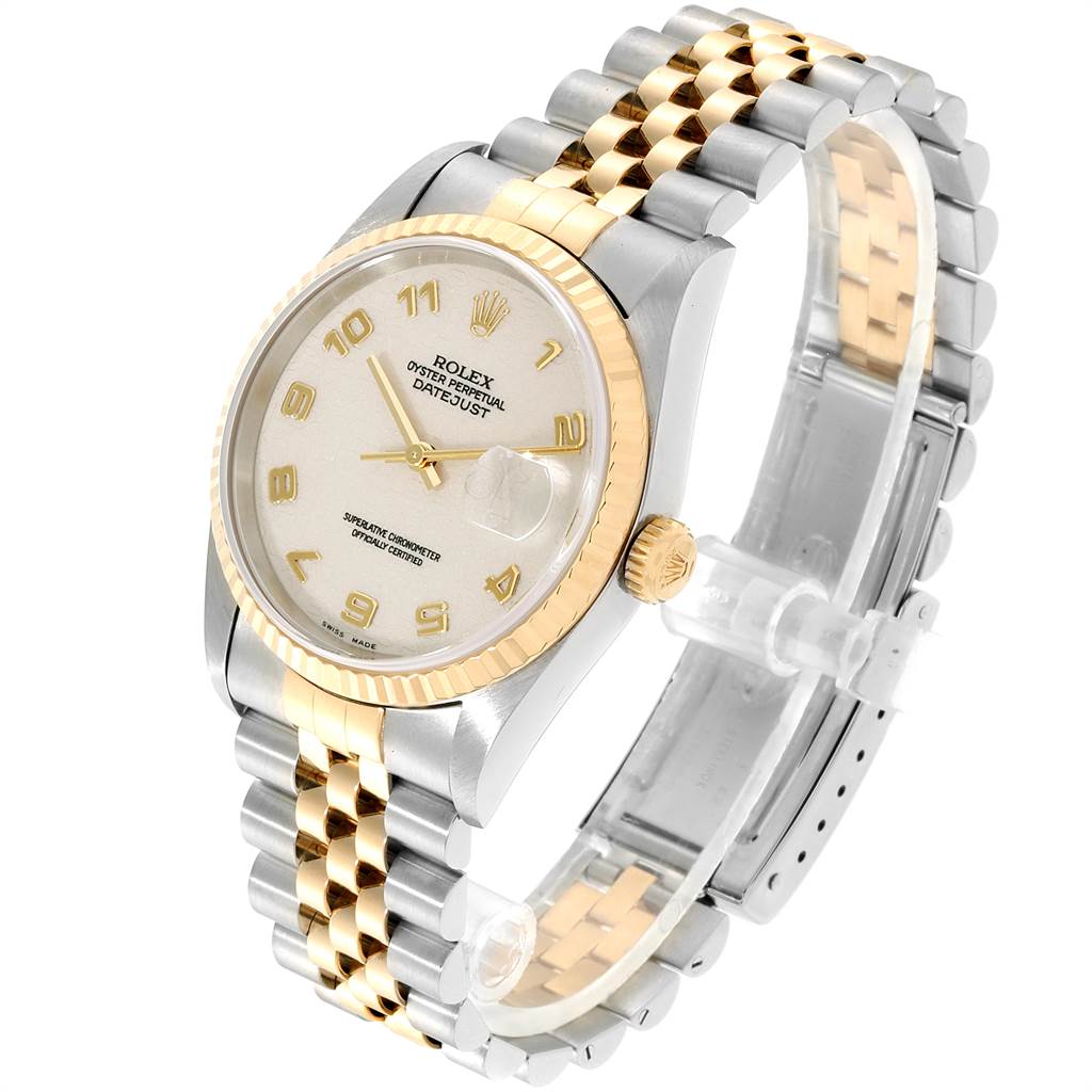 This image shows a Rolex Datejust 16233 Men
s Steel and Gold (two tone) Beige Dial 16233 Men
s Steel and Gold (two tone) Beige Dial watch at a three-quarter angle, highlighting its face, bezel, crown, and two-tone bracelet.