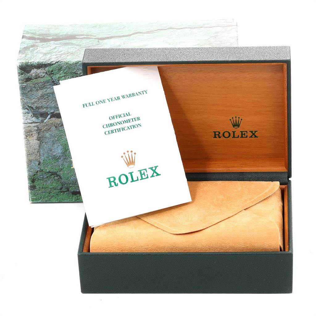 This image shows the open box of a Rolex Datejust 16233 Men
s Steel and Gold (two tone) Beige Dial 16233 Men
s Steel and Gold (two tone) Beige Dial watch, along with warranty and certification documents.