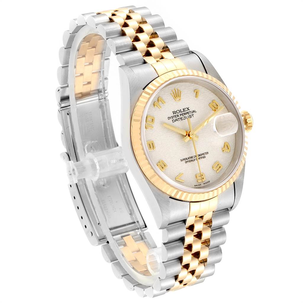 The image shows a Rolex Datejust 16233 Men
s Steel and Gold (two tone) Beige Dial 16233 Men
s Steel and Gold (two tone) Beige Dial watch at an angled view, highlighting its dial, two-tone strap, and fluted bezel.