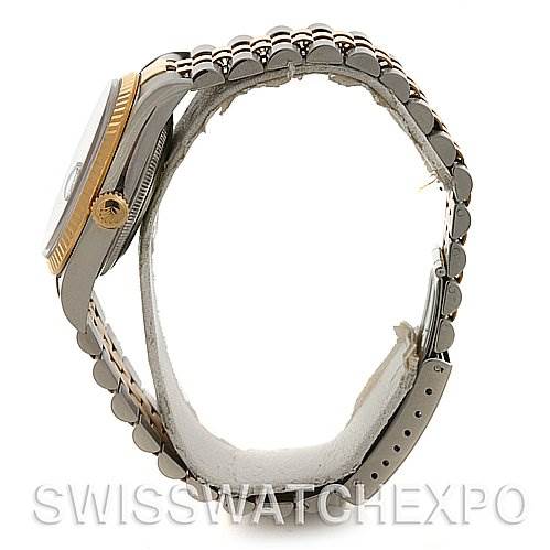 The image shows a side view of a Rolex Datejust 16233 Men's Stainless Steel Black Dial 16233 Men's Stainless Steel Black Dial watch, including parts of the case, bezel, and bracelet.