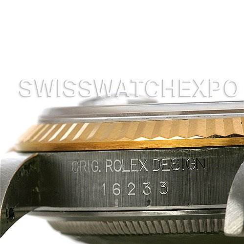 This image shows a side view of the Rolex Datejust 16233 Men's Stainless Steel Black Dial 16233 Men's Stainless Steel Black Dial watch case, focusing on the bezel and part of the engraved serial number.