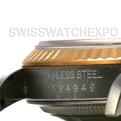 The image shows a side view of a Rolex Datejust 16233 Men's Stainless Steel Black Dial 16233 Men's Stainless Steel Black Dial watch case with visible "Stainless Steel" engraving and serial number.
