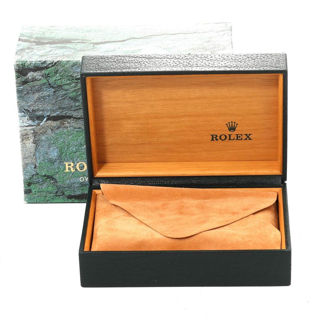 The image shows an open Rolex Datejust 16234 Men's Stainless Steel White Dial 16234 Men's Stainless Steel White Dial watch box with a tan pouch inside and a green textured outer box.