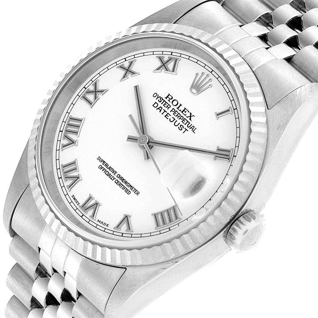 The image shows a close-up of the Rolex Datejust 16234 Men's Stainless Steel White Dial 16234 Men's Stainless Steel White Dial watch at an angle, highlighting the dial, fluted bezel, and part of the bracelet.