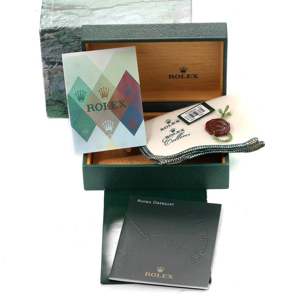 This image shows the packaging, manuals, and accessories for a Rolex Datejust 116233 Men's Stainless Steel Mother of Pearl Dial 116233 Men's Stainless Steel Mother of Pearl Dial watch viewed from a front angle.