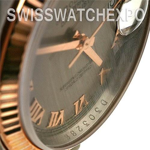 The image shows a close-up of the Rolex Datejust 116231 Men's Stainless Steel Silver Dial 116231 Men's Stainless Steel Silver Dial watch face, highlighting the hands, Roman numerals, and fluted bezel.