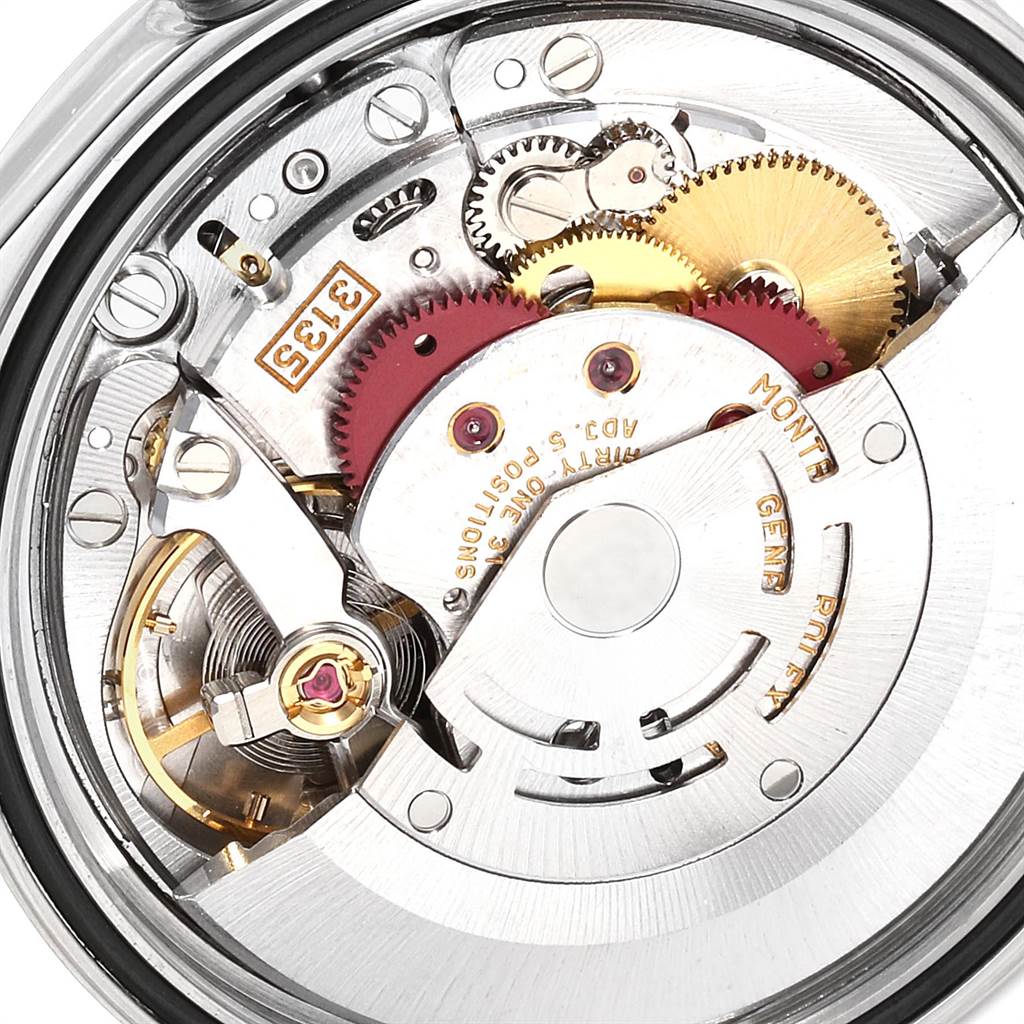 This image shows a close-up of the internal movement mechanics of a Rolex Datejust 16200 Men's Stainless Steel White Dial 16200 Men's Stainless Steel White Dial watch.