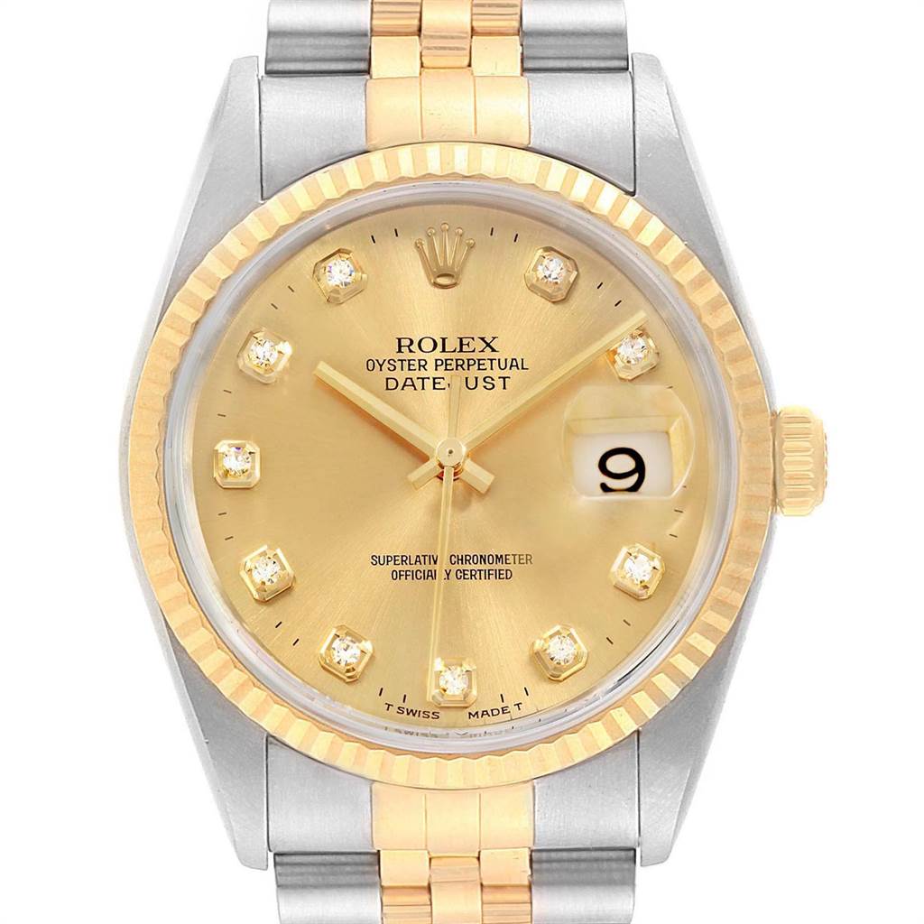 This is a frontal view of a Rolex Datejust 16233 Men
s Steel and Gold (two tone) Champagne Dial 16233 Men
s Steel and Gold (two tone) Champagne Dial watch showing the dial, bezel, crown, and part of the bracelet.