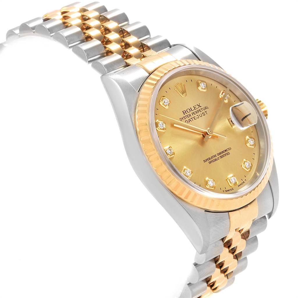 This image shows the Rolex Datejust 16233 Men
s Steel and Gold (two tone) Champagne Dial 16233 Men
s Steel and Gold (two tone) Champagne Dial watch at an oblique angle, displaying the face, bezel, and bracelet.