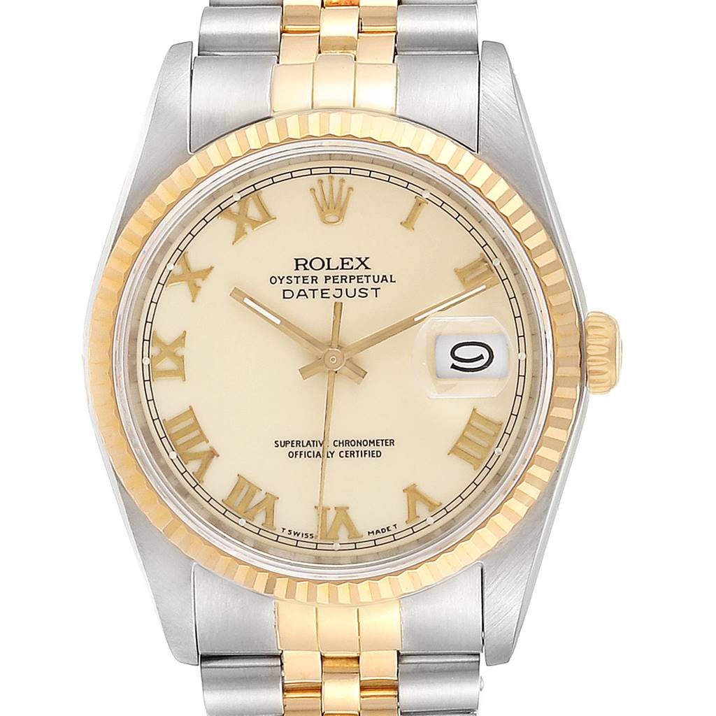 This image shows a Rolex Datejust 16233 Men
s Steel and Gold (two tone) Beige Dial 16233 Men
s Steel and Gold (two tone) Beige Dial watch from a front angle, highlighting the dial, bezel, hands, Roman numerals, and bracelet.