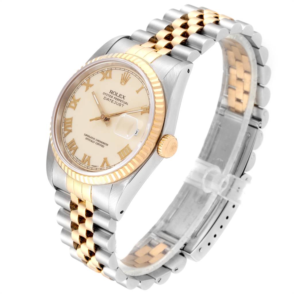 This image shows a Rolex Datejust 16233 Men
s Steel and Gold (two tone) Beige Dial 16233 Men
s Steel and Gold (two tone) Beige Dial watch at an angled view, highlighting its dial, bracelet, crown, and fluted bezel.