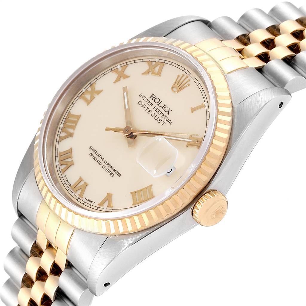 The image shows a Rolex Datejust 16233 Men
s Steel and Gold (two tone) Beige Dial 16233 Men
s Steel and Gold (two tone) Beige Dial watch at an angle, highlighting the dial, bezel, crown, and part of the bracelet.