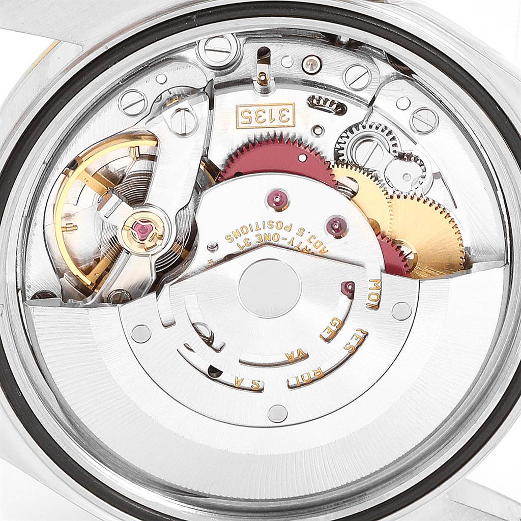 This image shows the internal mechanical movement parts of a Rolex Datejust 16233 Men
s Steel and Gold (two tone) Black Dial 16233 Men
s Steel and Gold (two tone) Black Dial watch from a rear angle.