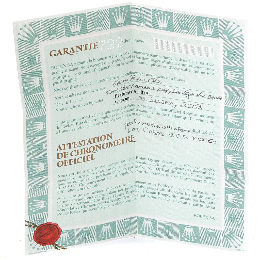 This image shows the warranty and official chronometer certification documents for a Rolex Datejust 16233 Men
s Steel and Gold (two tone) Black Dial 16233 Men
s Steel and Gold (two tone) Black Dial watch.