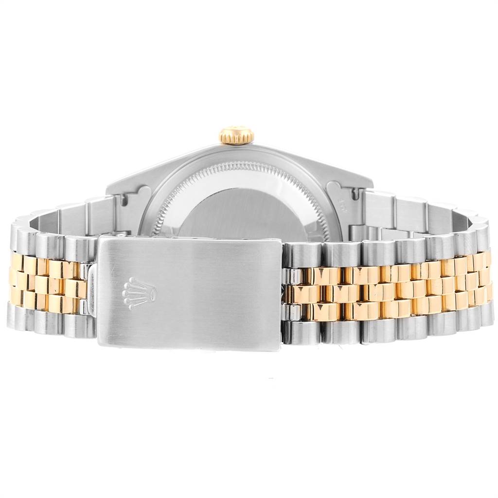 This image shows the back view of the Rolex Datejust 16233 Men
s Steel and Gold (two tone) Black Dial 16233 Men
s Steel and Gold (two tone) Black Dial watch, highlighting the clasp and bracelet.