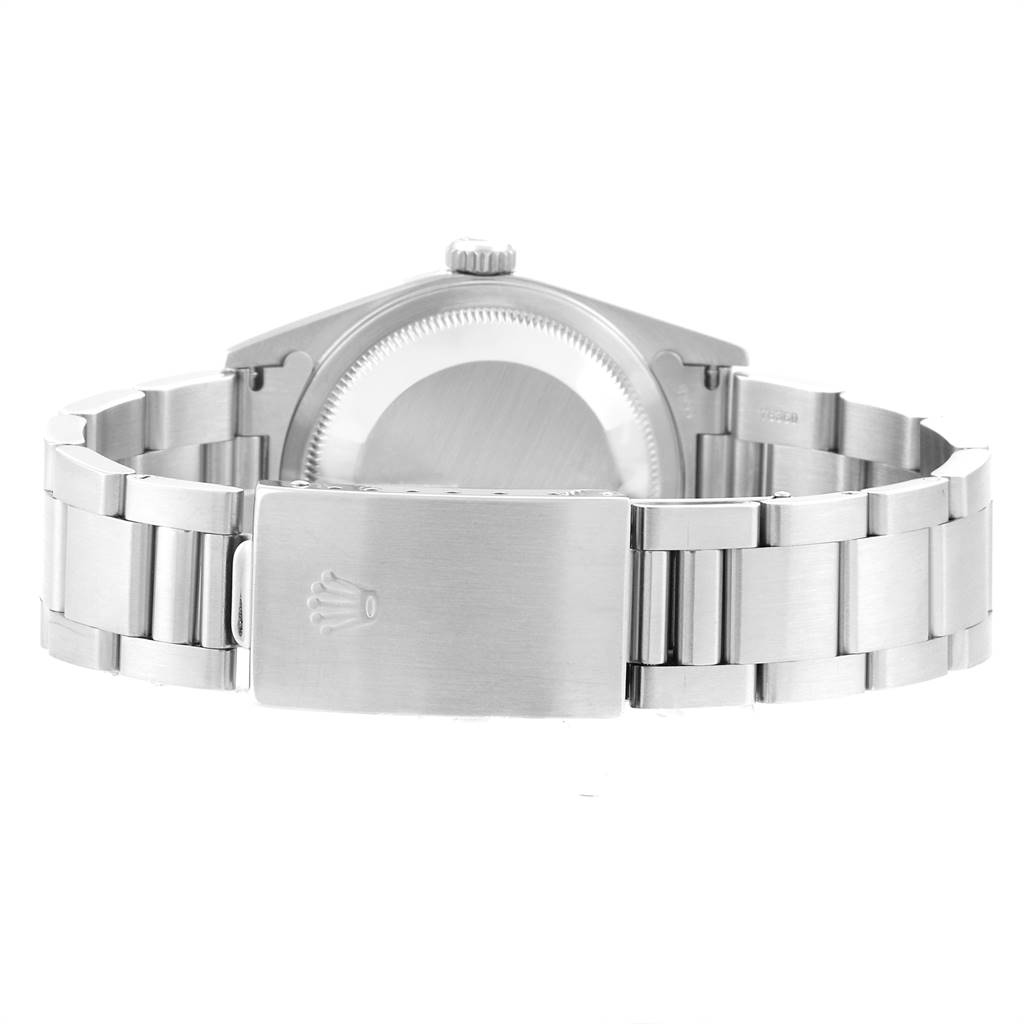 The image shows the back view of a Rolex Datejust 16200 Men's Stainless Steel White Dial 16200 Men's Stainless Steel White Dial watch, highlighting the case back, crown, and metal bracelet with the clasp closed.