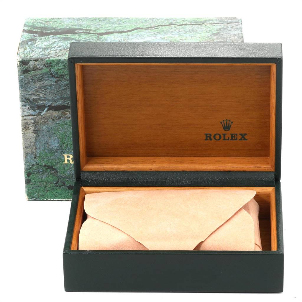 This image shows an open Rolex Datejust 16233 Men's Steel and Gold (two tone) White Dial 16233 Men's Steel and Gold (two tone) White Dial watch box with a closed beige envelope inside.