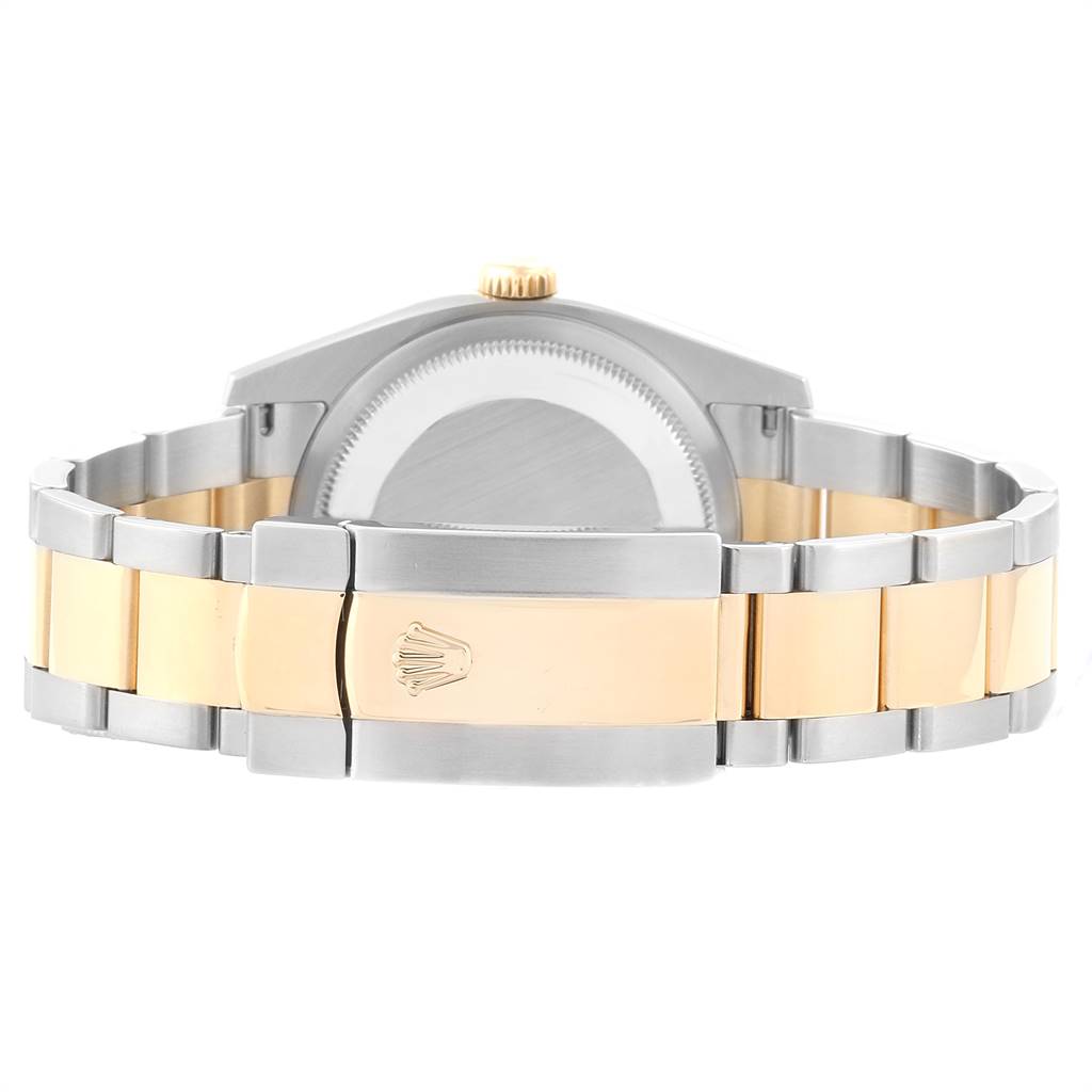 This image shows the back of the Rolex Datejust 116203 Men
s Steel and Gold (two tone) Blue Dial 116203 Men
s Steel and Gold (two tone) Blue Dial watch, highlighting the clasp, bracelet, and caseback.