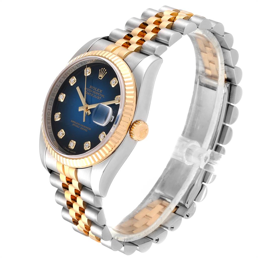 The image shows a Rolex Datejust 116233 Men
s Stainless Steel Blue Dial 116233 Men
s Stainless Steel Blue Dial watch at an angle, highlighting its two-tone bracelet, blue dial, diamond hour markers, and fluted bezel.