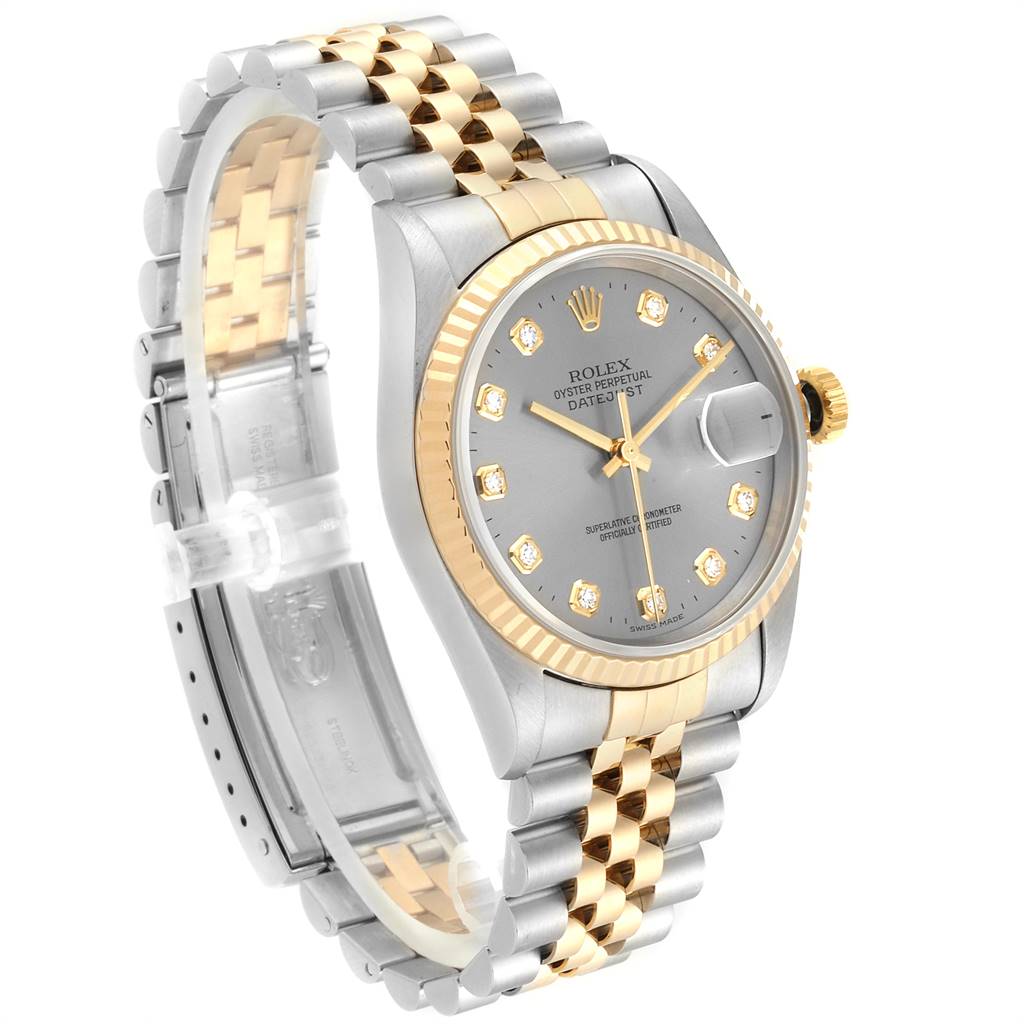 This image shows a Rolex Datejust 16233 Men's Steel and Gold (two tone) Silver Dial 16233 Men's Steel and Gold (two tone) Silver Dial watch at an angle highlighting its face, bezel, case, and two-tone bracelet.