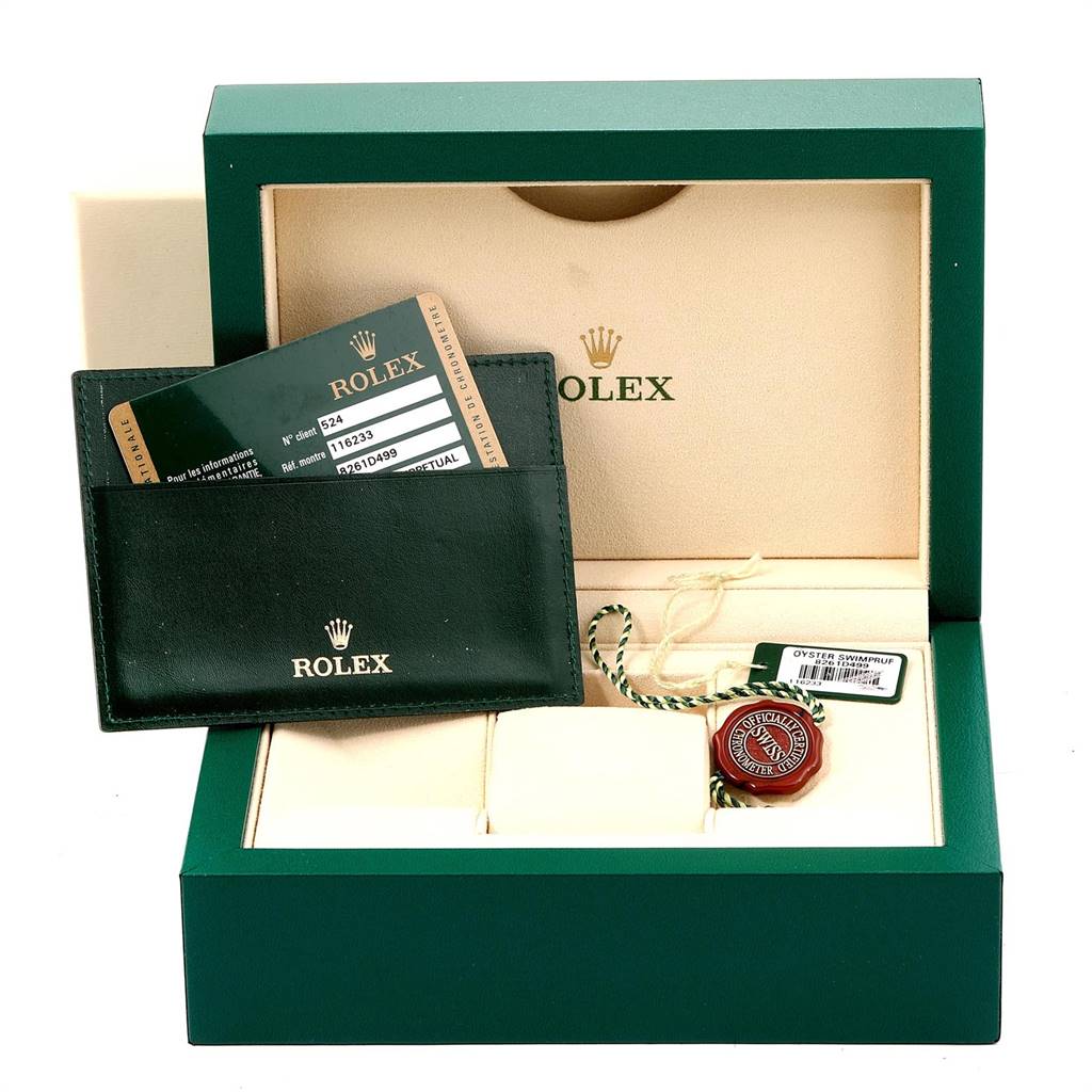 The image shows a Rolex Datejust 116233 Men
s Stainless Steel Mother of Pearl Dial 116233 Men
s Stainless Steel Mother of Pearl Dial box with a warranty card holder, tags, and certification seal.