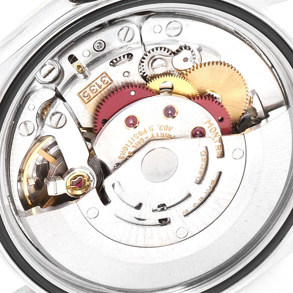 This image shows a close-up view of the movement mechanism inside a Rolex Datejust 16233 Men
s Steel and Gold (two tone) Blue Dial 16233 Men
s Steel and Gold (two tone) Blue Dial watch.