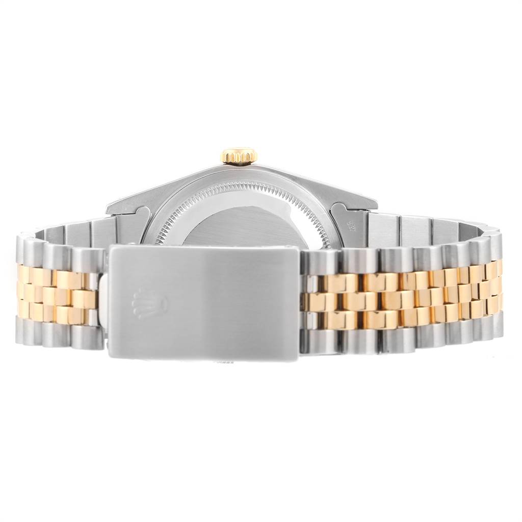 This image shows the back view of a Rolex Datejust 16233 Men
s Steel and Gold (two tone) Blue Dial 16233 Men
s Steel and Gold (two tone) Blue Dial watch, highlighting its two-tone bracelet and clasp.