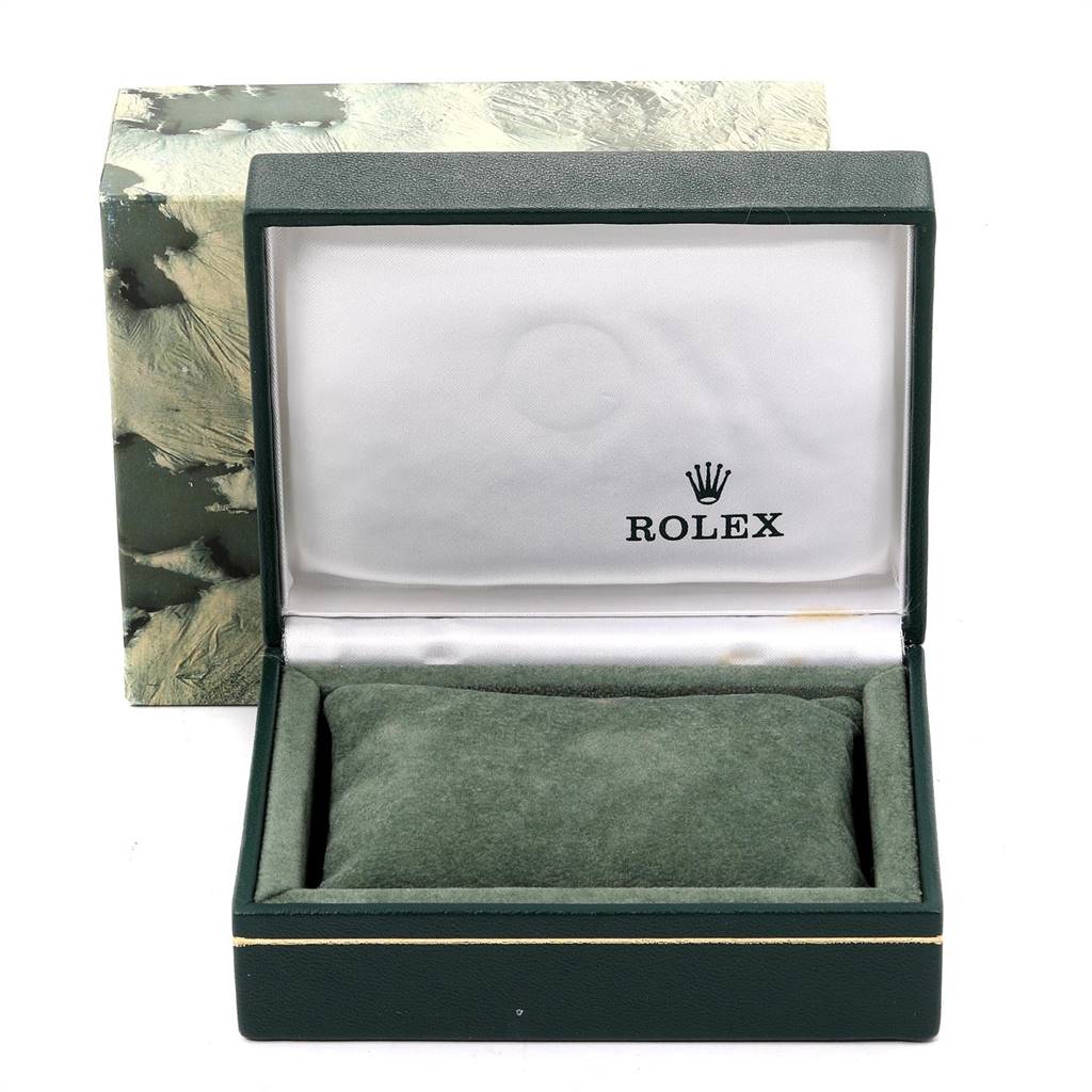 The image shows an open box for a Rolex Datejust 16233 Men
s Steel and Gold (two tone) Blue Dial 16233 Men
s Steel and Gold (two tone) Blue Dial watch, displaying the inner cushion and the brand logo inside the lid.