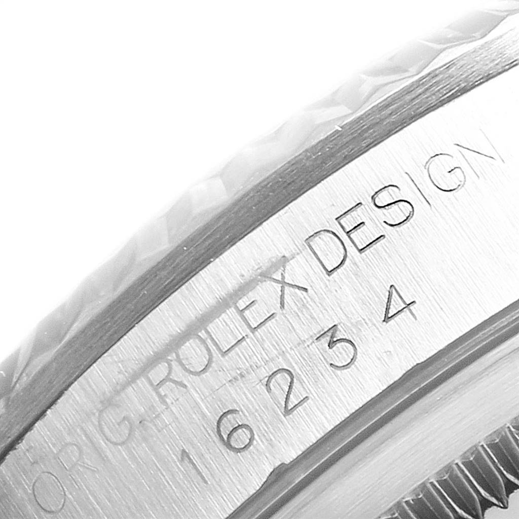 This close-up image shows the model number and "Rolex Design" engraving on the case side of a Rolex Datejust 16234 Men's Stainless Steel Silver Dial 16234 Men's Stainless Steel Silver Dial watch.