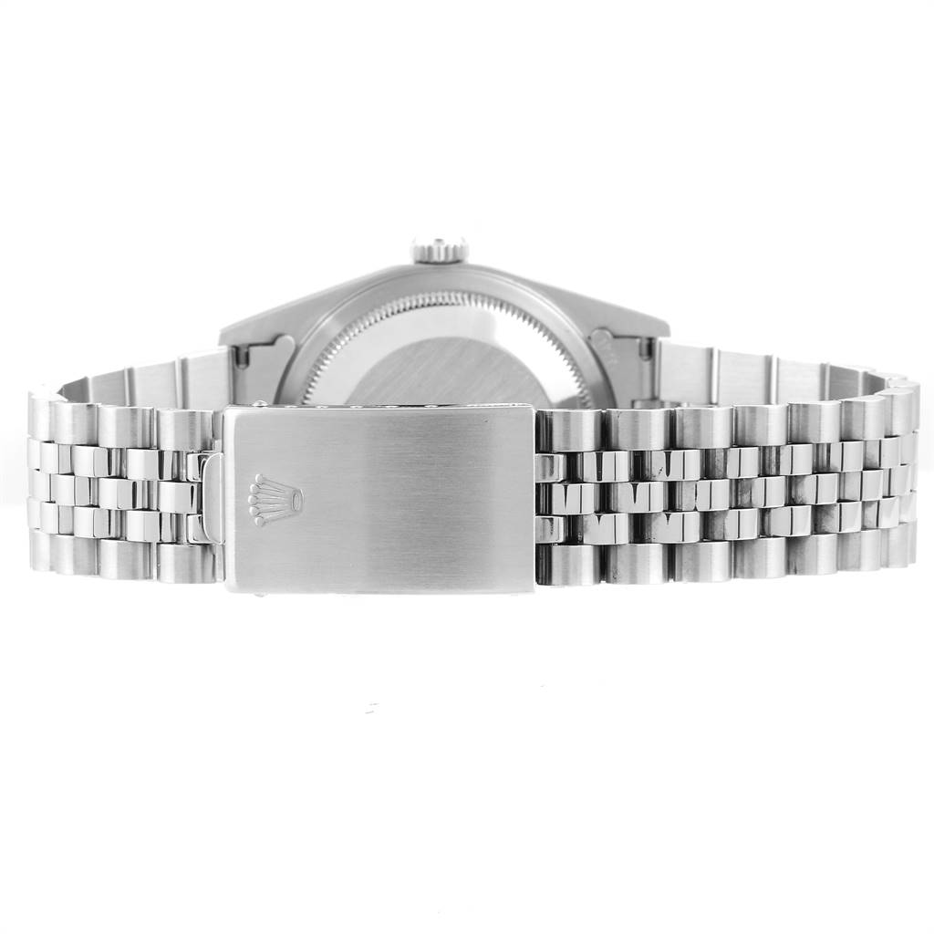 The image shows the back view of a Rolex Datejust 16234 Men's Stainless Steel Silver Dial 16234 Men's Stainless Steel Silver Dial watch, focusing on the bracelet and clasp with the signature logo.