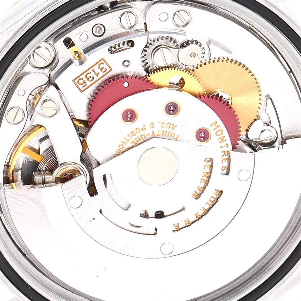 This is a close-up view of the Rolex Datejust 16233 Men
s Steel and Gold (two tone) Champagne Dial 16233 Men
s Steel and Gold (two tone) Champagne Dial movement, showcasing its intricate gears and components.