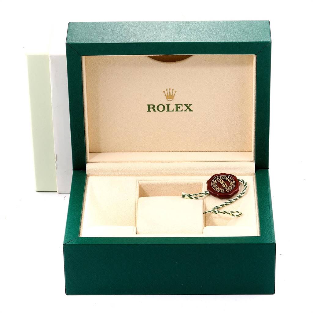 The image shows an open Rolex Datejust 16233 Men
s Steel and Gold (two tone) Champagne Dial 16233 Men
s Steel and Gold (two tone) Champagne Dial watch box with a tag accessory inside.