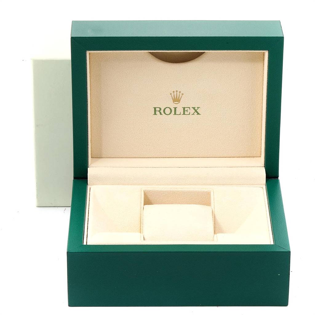The image shows a green Rolex Datejust 16234 Men's Stainless Steel Silver Dial 16234 Men's Stainless Steel Silver Dial watch box, open to display its beige interior compartments.