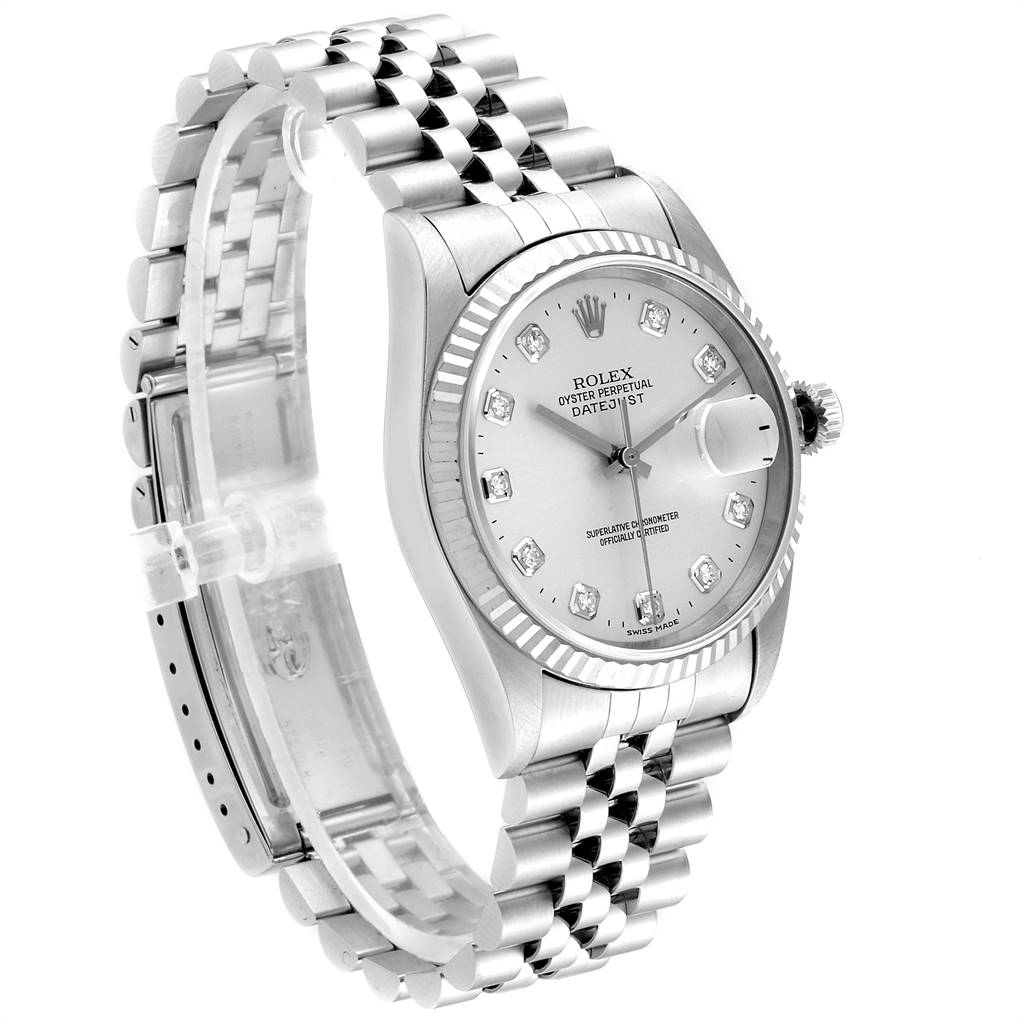 The Rolex Datejust 16234 Men's Stainless Steel Silver Dial 16234 Men's Stainless Steel Silver Dial watch is shown from an angled side view, highlighting its face, fluted bezel, crown, and Jubilee bracelet.