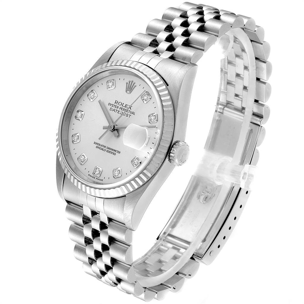 This image shows a Rolex Datejust 16234 Men's Stainless Steel Silver Dial 16234 Men's Stainless Steel Silver Dial watch, angled to display the face, fluted bezel, and Jubilee bracelet.