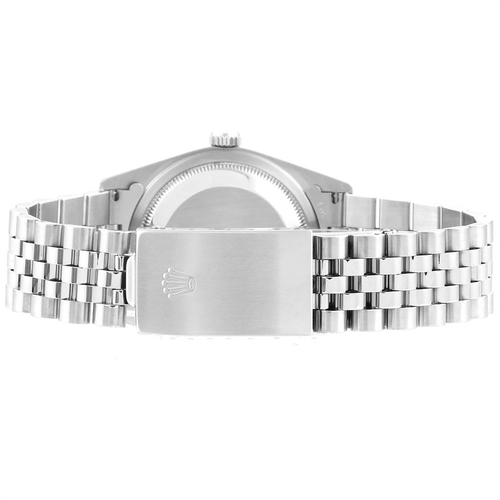 The image shows the back view of a Rolex Datejust 16234 Men's Stainless Steel Silver Dial 16234 Men's Stainless Steel Silver Dial model, featuring its clasp and bracelet.